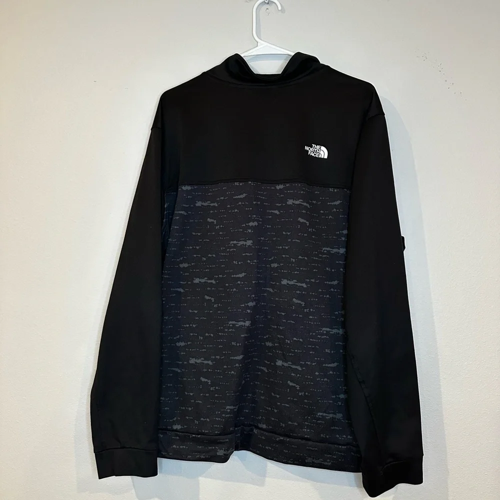 The North Face full zip up black and gray unisex size extra large‎ sweatshirt.